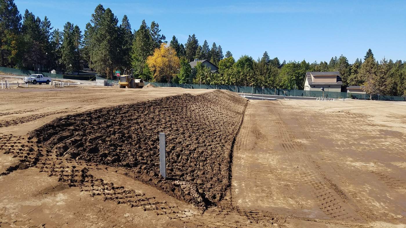 Finished sidewalk and tracked slope on a central Oregon road project.
